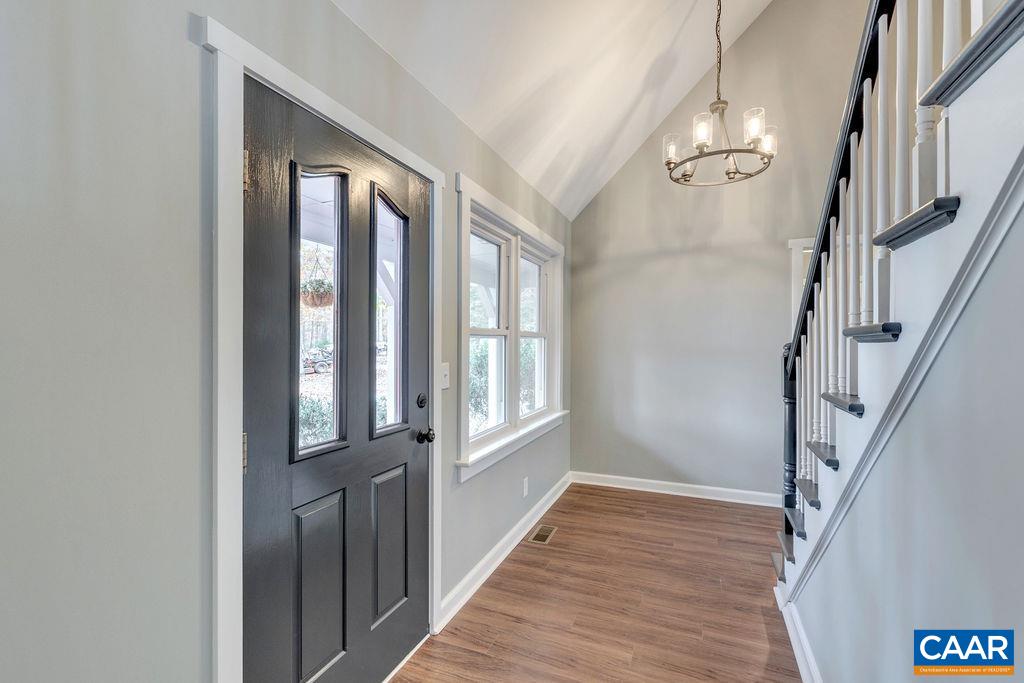 1900 Thunder Ridge Road Afton, VA 22920 - Photo 17 of 49 a view of an entryway with wooden floor and stairs