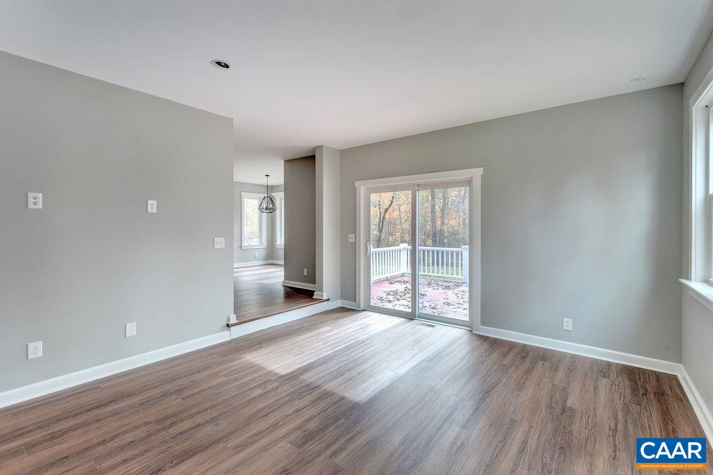 1900 Thunder Ridge Road Afton, VA 22920 - Photo 19 of 49 wooden floor in an empty room with a window