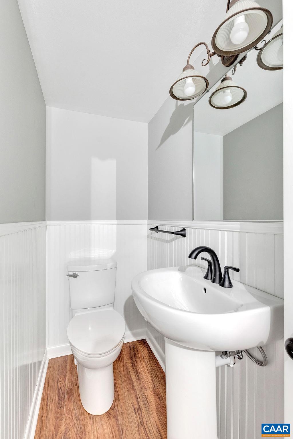 1900 Thunder Ridge Road Afton, VA 22920 - Photo 27 of 49 a bathroom with a sink a toilet and a mirror