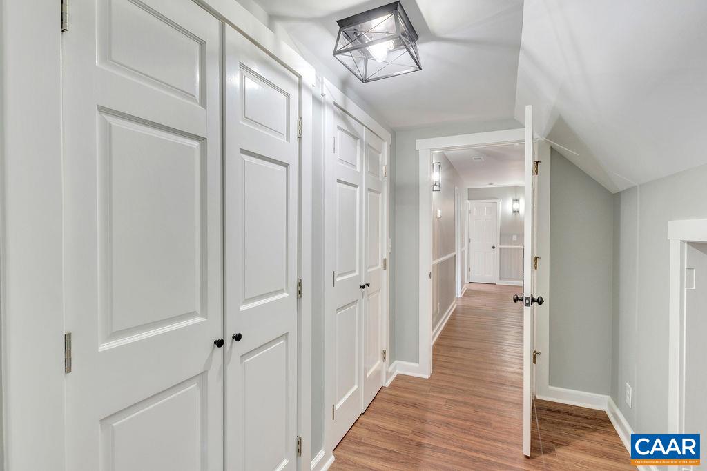 1900 Thunder Ridge Road Afton, VA 22920 - Photo 34 of 49 a view of a hallway with wooden floor