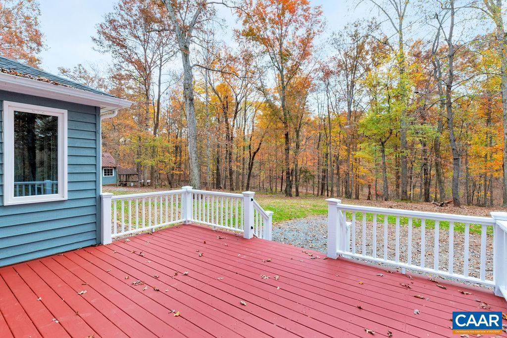 1900 Thunder Ridge Road Afton, VA 22920 - Photo 44 of 49 a view of a wooden deck and a yard