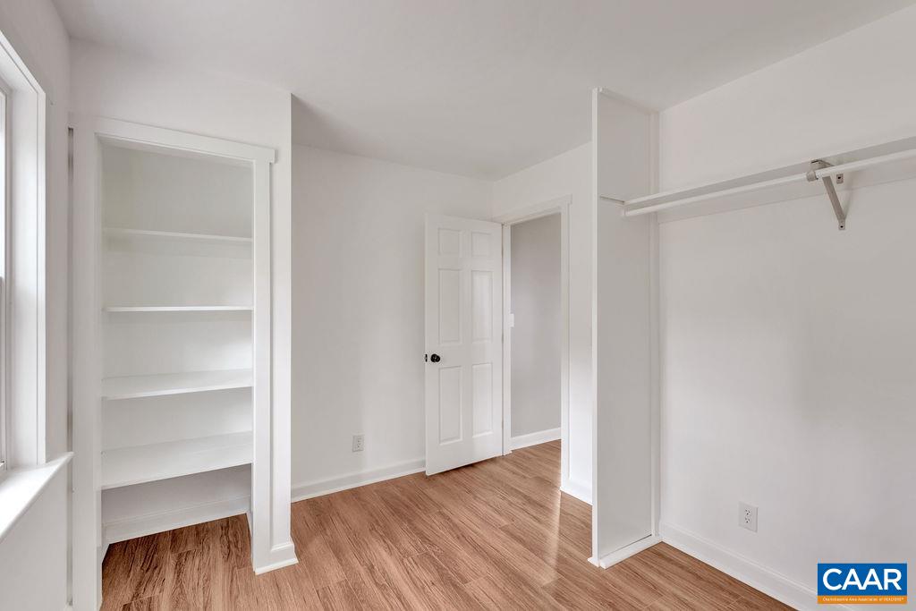 1900 Thunder Ridge Road Afton, VA 22920 - Photo 8 of 49 a view of an empty room with wooden floor