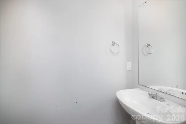 a bathroom with a sink and a vanity