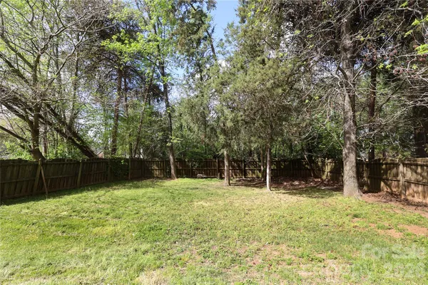 a house with trees in front of it