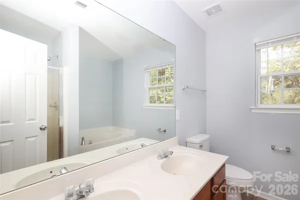 a bathroom with a sink and a bathtub