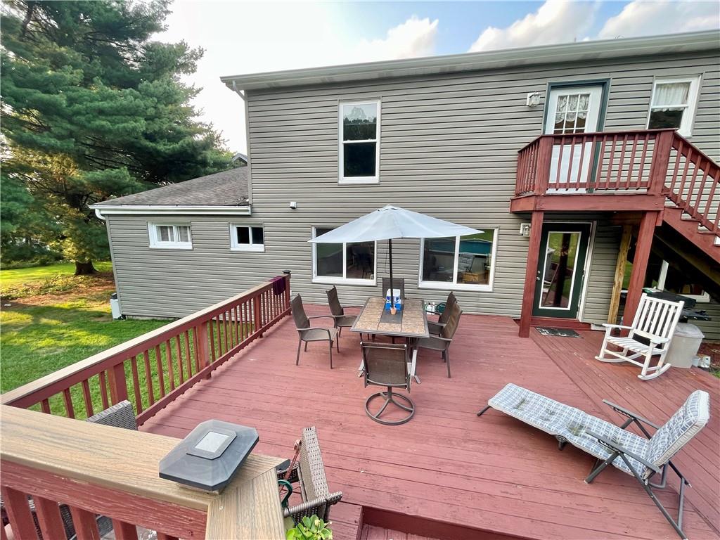 1324 G I Road Spring Church, PA 15686 - Photo 31 of 31 a view of a house with wooden deck and furniture