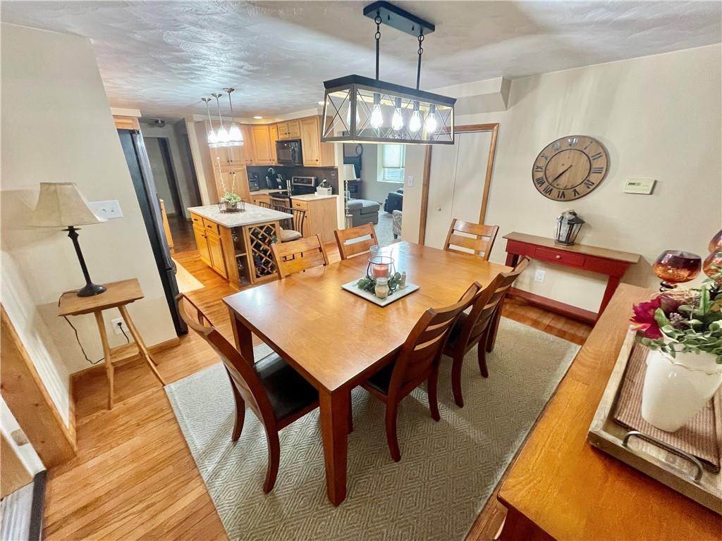 1324 G I Road Spring Church, PA 15686 - Photo 9 of 31 a view of a dining room with furniture and wooden floor