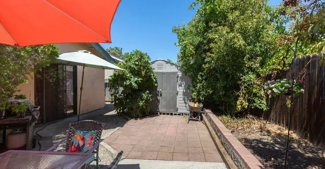 a balcony with view of outdoor space