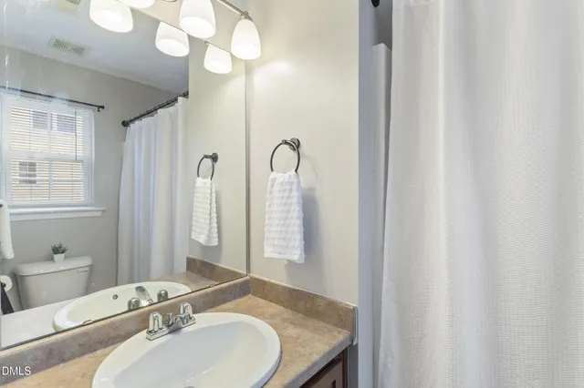 a view of a livingroom with wooden floor