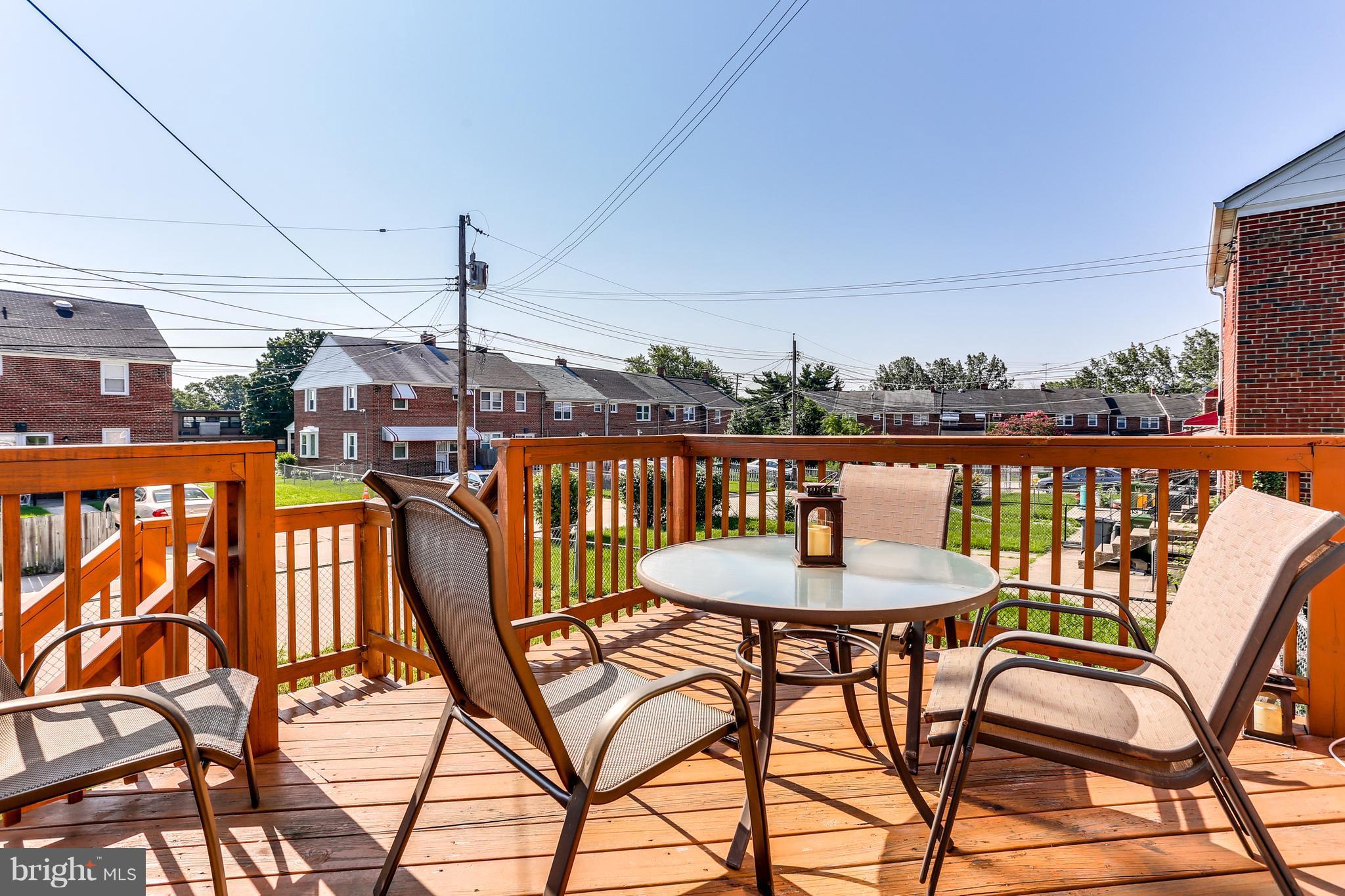 6117 Edlynne Road Baltimore, MD 21239 - Photo 2 of 18 a outdoor view with a sitting space