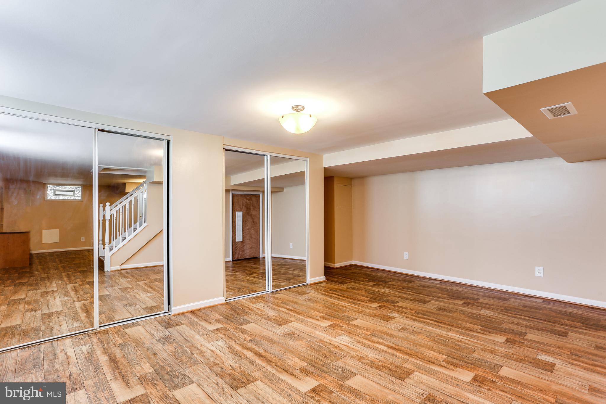 6117 Edlynne Road Baltimore, MD 21239 - Photo 17 of 18 a view of an empty room