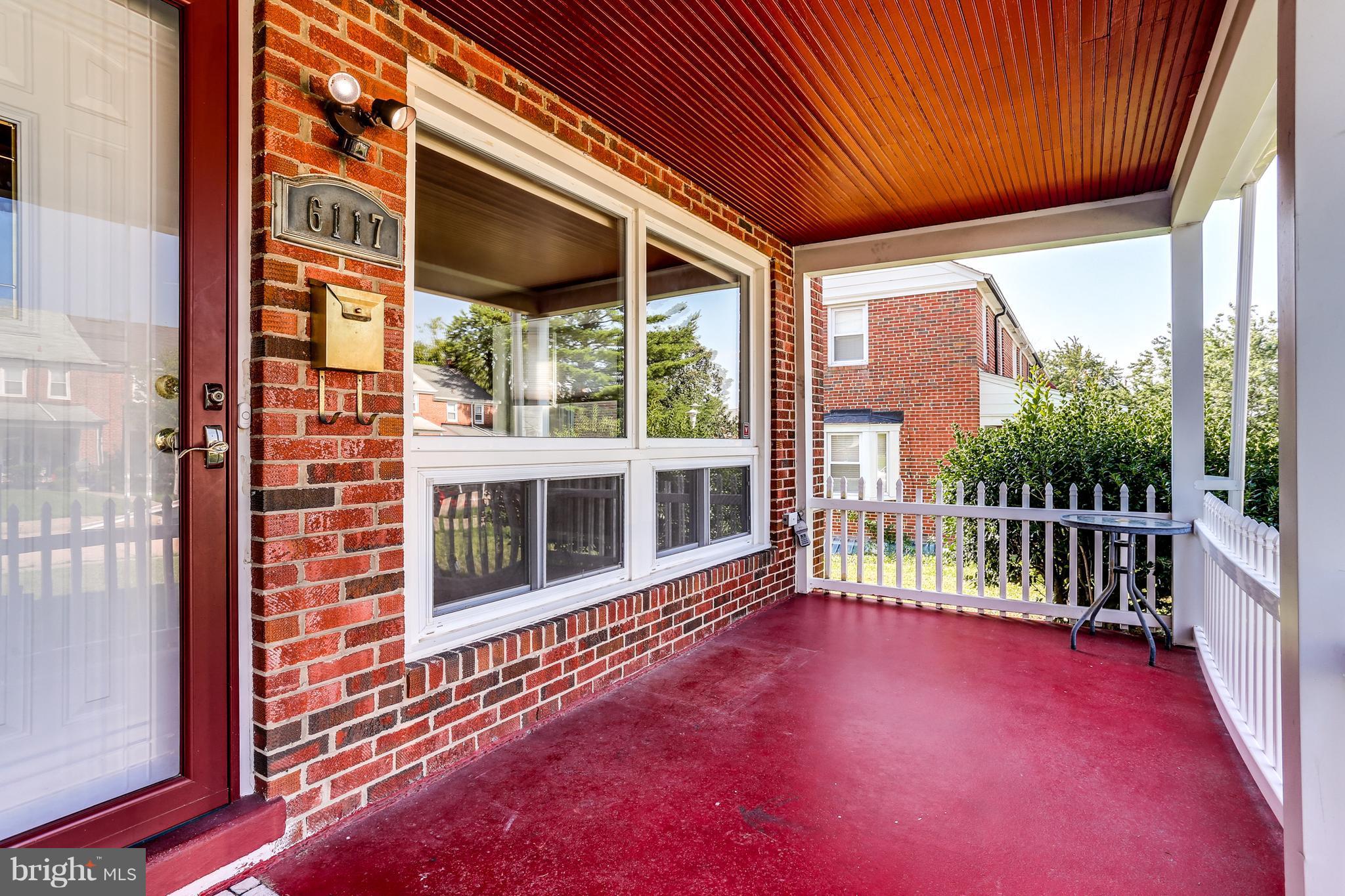 6117 Edlynne Road Baltimore, MD 21239 - Photo 3 of 18 a view of porch with a porch