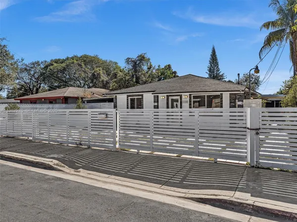 a view of a house with a garage