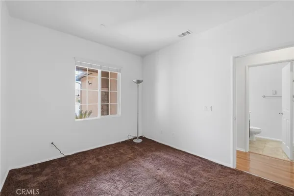 a bathroom with a sink toilet and a mirror