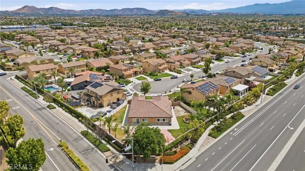 an aerial view of residential houses with outdoor space