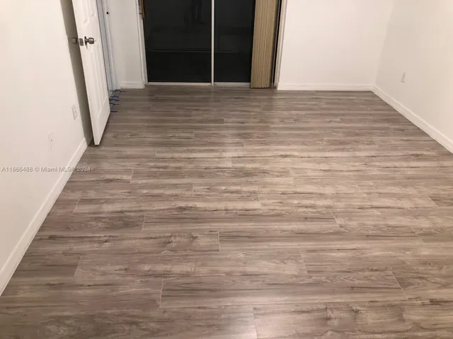 a view of swimming pool with a yard