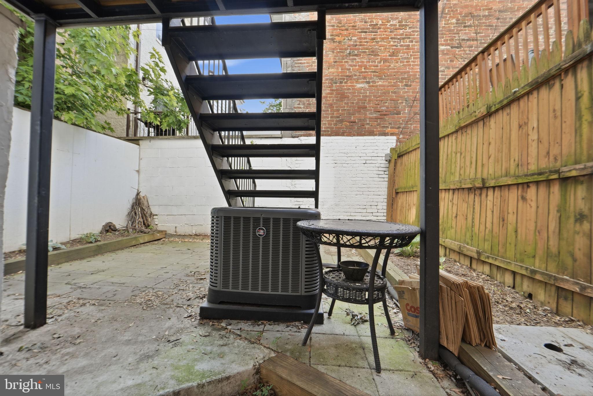 706 12th Street Northeast Washington, DC 20002 - Photo 42 of 49 a view of balcony with wooden floor and outdoor seating