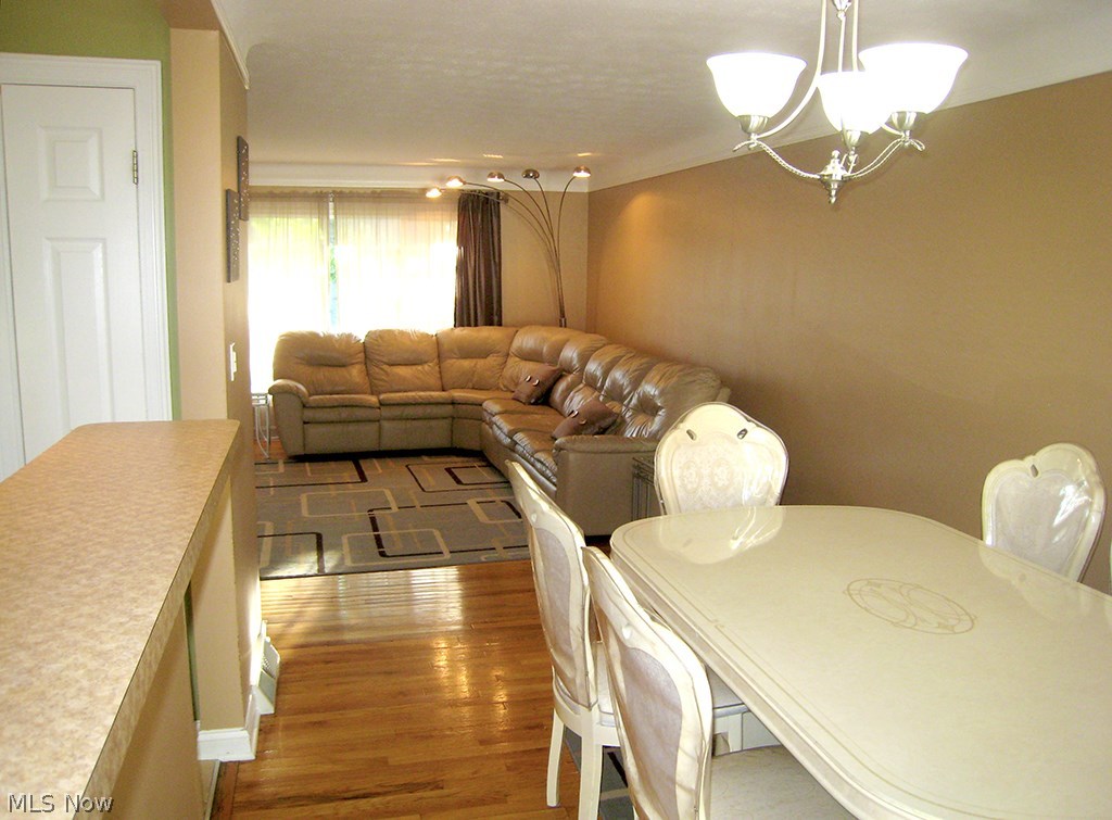 6925 Maplewood Road Parma Heights, OH 44130 - Photo 5 of 25 Separate dinning area leading into living room.