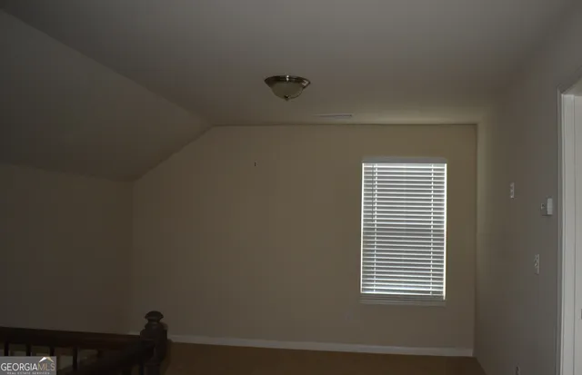 a view of a small space with a window