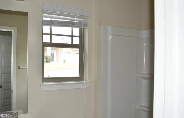 a view of a room with racks on the wall