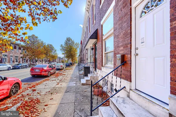 a view of street with parked cars