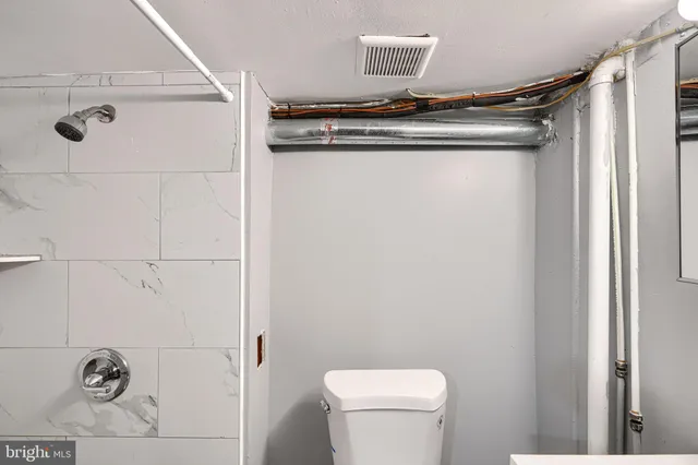 a close view of shower tap