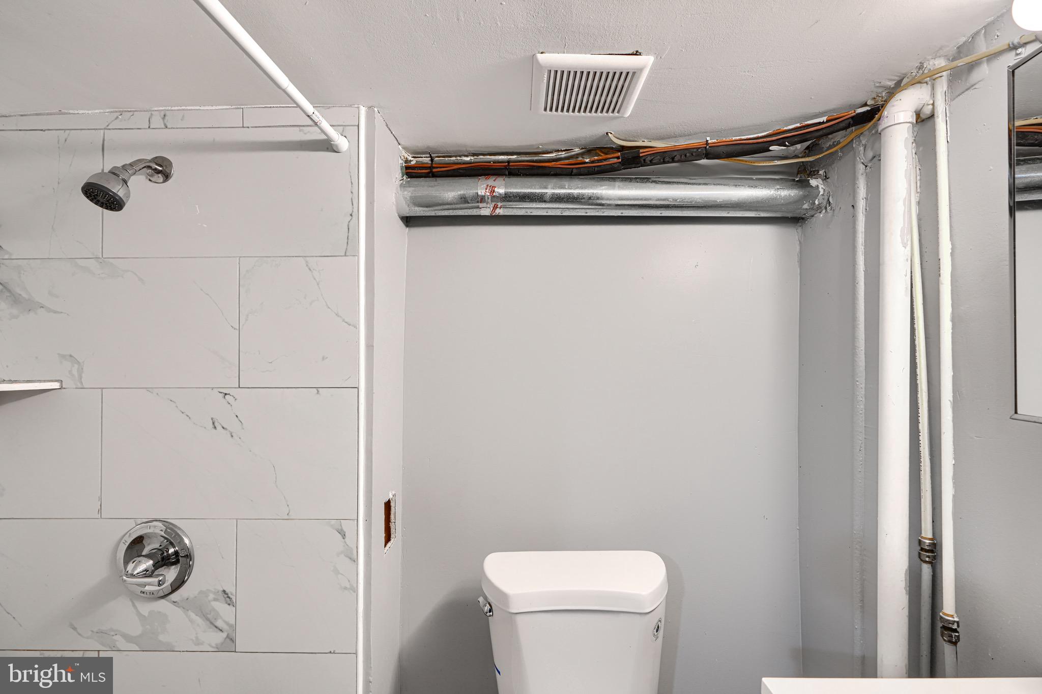 424 North Linwood Avenue Baltimore, MD 21224 - Photo 28 of 28 a close view of shower tap