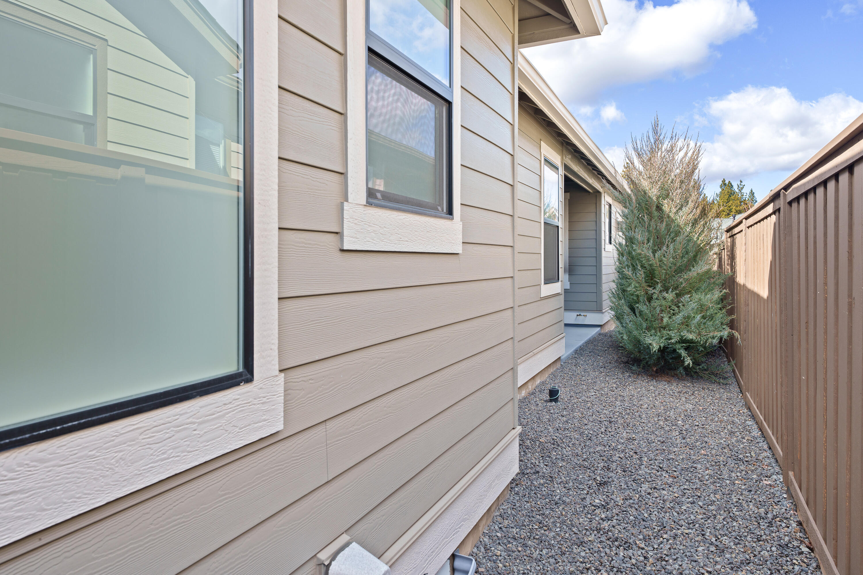 2296 Northwest Skyline Ranch Road Bend, OR 97703 - Photo 8 of 36 Side yard (off patio)