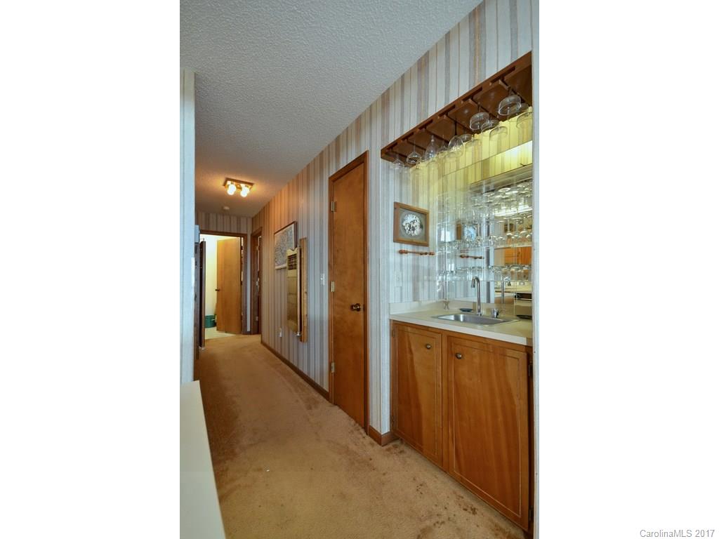 600 Brandywine Road, Unit 8 Waynesville, NC 28786 - Photo 7 of 18 a view of a bathroom with a tub and shower