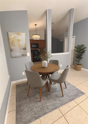 a view of a dining room with furniture
