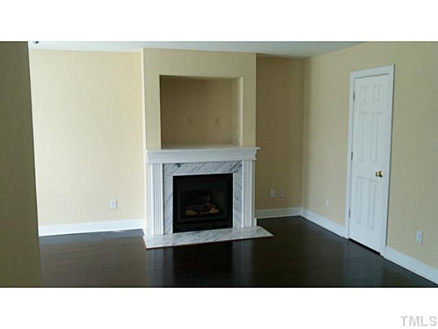 4900 Windsprint Way Raleigh, NC 27616 - Photo 4 of 16 a black and white photo of a living room
