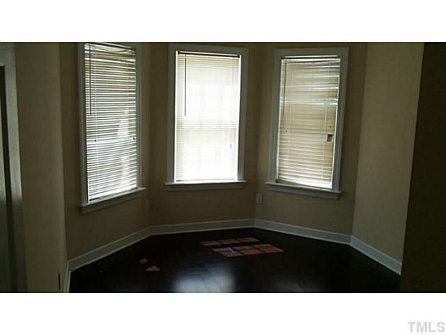 4900 Windsprint Way Raleigh, NC 27616 - Photo 5 of 16 a black and white photo of a living room