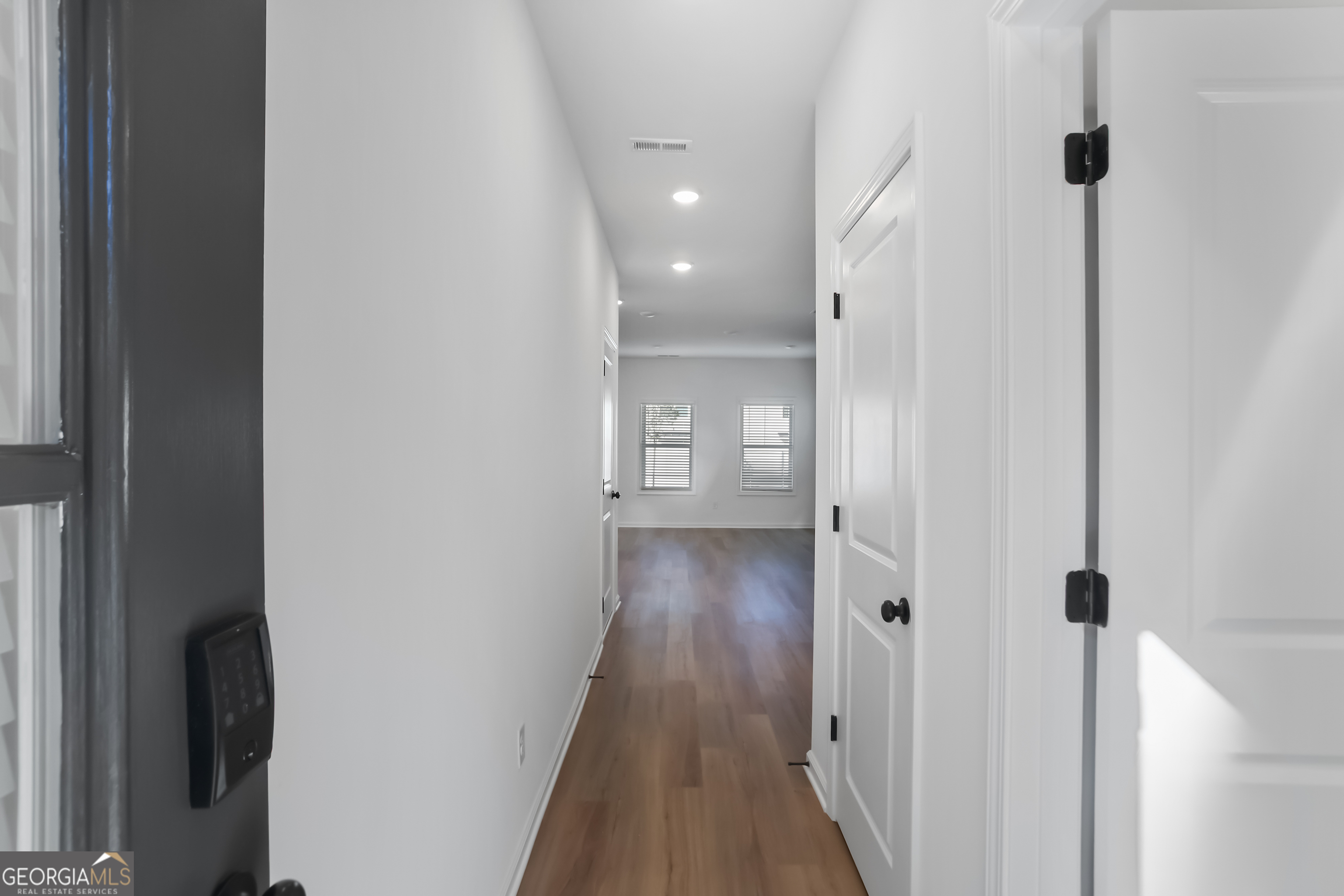 183 Jackson Heights, Unit 4 Cleveland, GA 30528 - Photo 3 of 28 Welcome home to 183 Jackson Heights! LVP flooring throughout the first level and in wet areas.