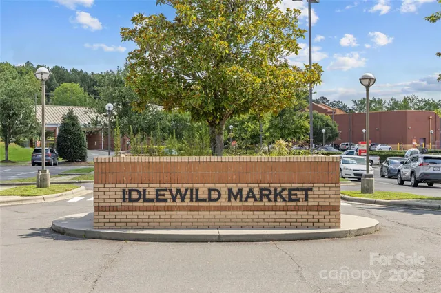 a front view of a building with glass windows and door
