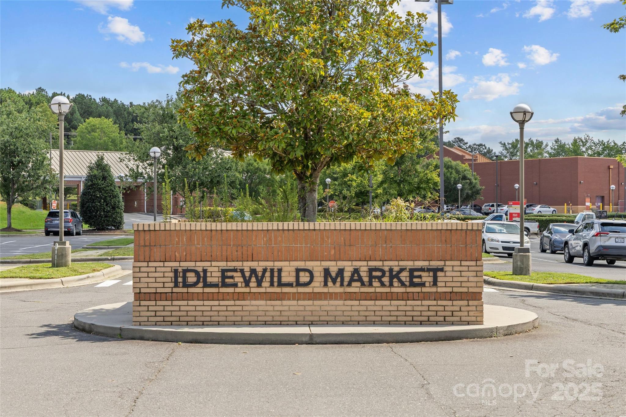 3017 Stevens Schultz Lane Matthews, NC 28104 - Photo 13 of 23 a view of swimming pool with large trees and couches chairs