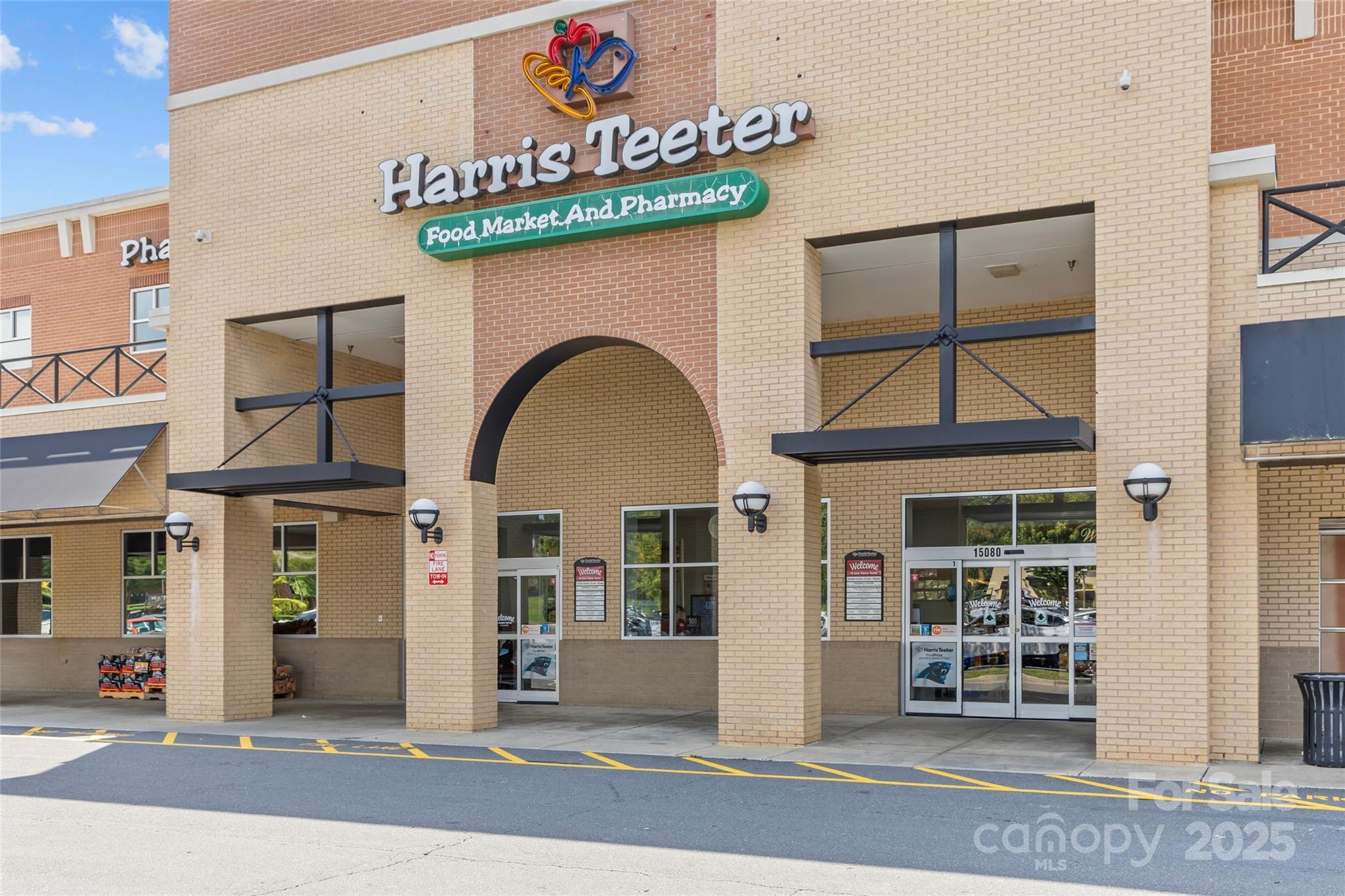 3017 Stevens Schultz Lane Matthews, NC 28104 - Photo 14 of 23 a front view of a building with glass windows and door