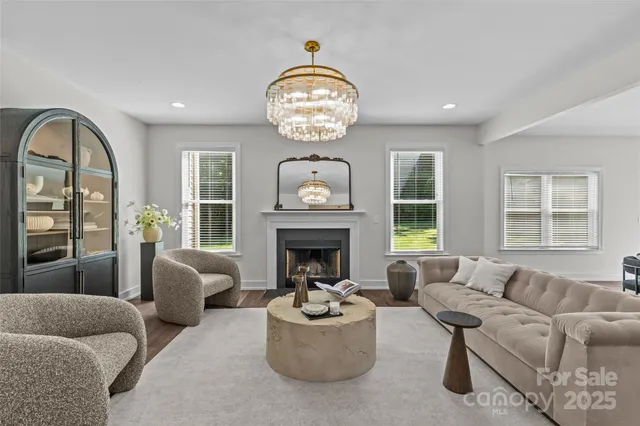 a kitchen with a table a sink and cabinets