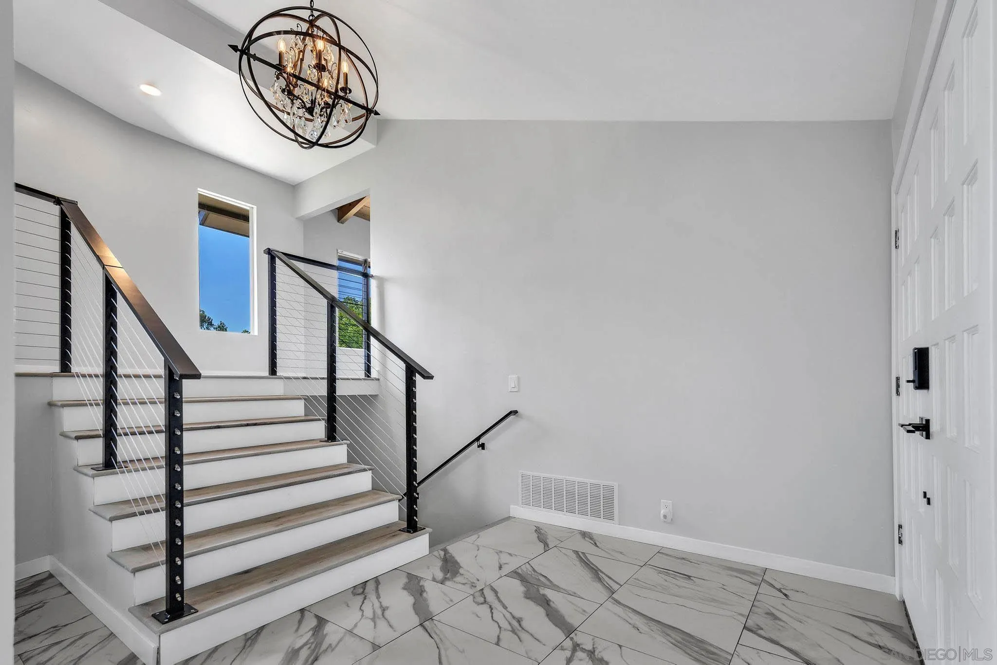 9817 Edgar Place La Mesa, CA 91941 - Photo 11 of 47 a view of entryway with stairs and wooden floor
