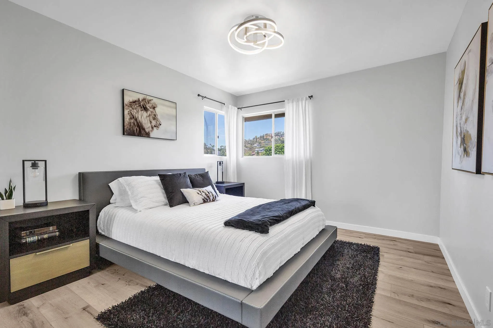 9817 Edgar Place La Mesa, CA 91941 - Photo 22 of 47 a bedroom with a bed and a window