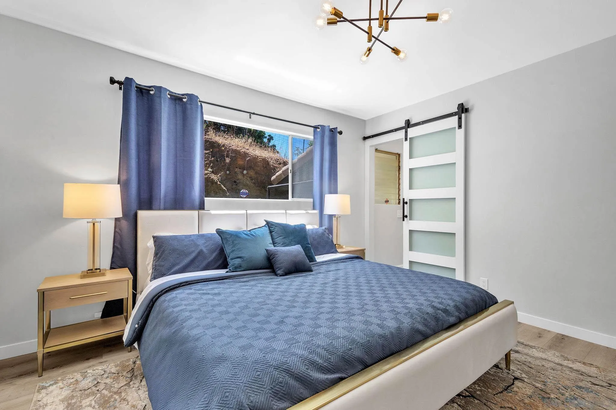 9817 Edgar Place La Mesa, CA 91941 - Photo 26 of 47 a bedroom with a large bed and a window