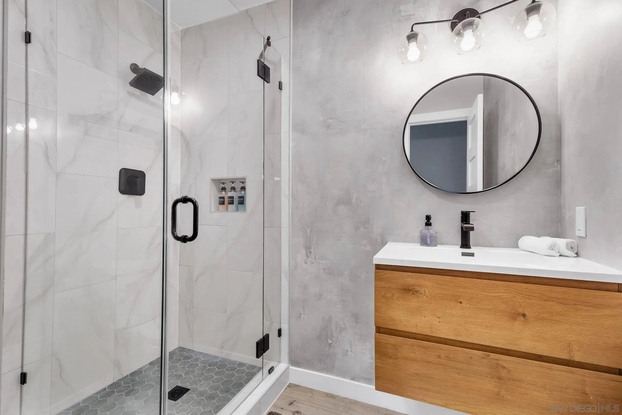 9817 Edgar Place La Mesa, CA 91941 - Photo 29 of 47 a bathroom with a sink and a mirror