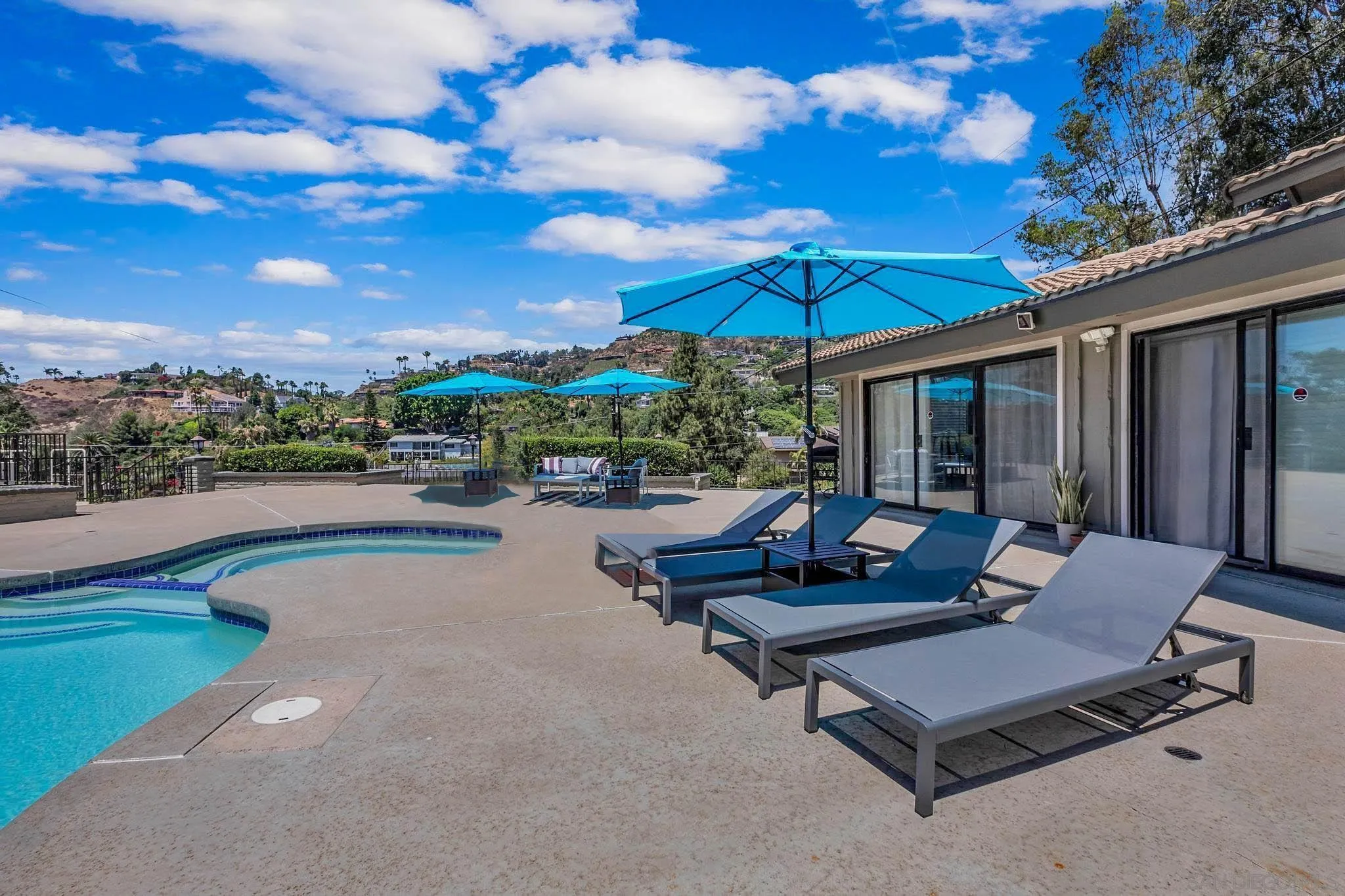 9817 Edgar Place La Mesa, CA 91941 - Photo 34 of 47 a view of a patio with swimming pool table and chairs