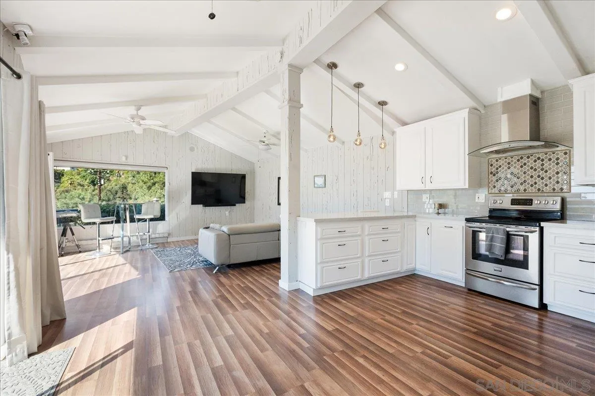 9817 Edgar Place La Mesa, CA 91941 - Photo 35 of 47 a view of a living room kitchen and a wooden floor