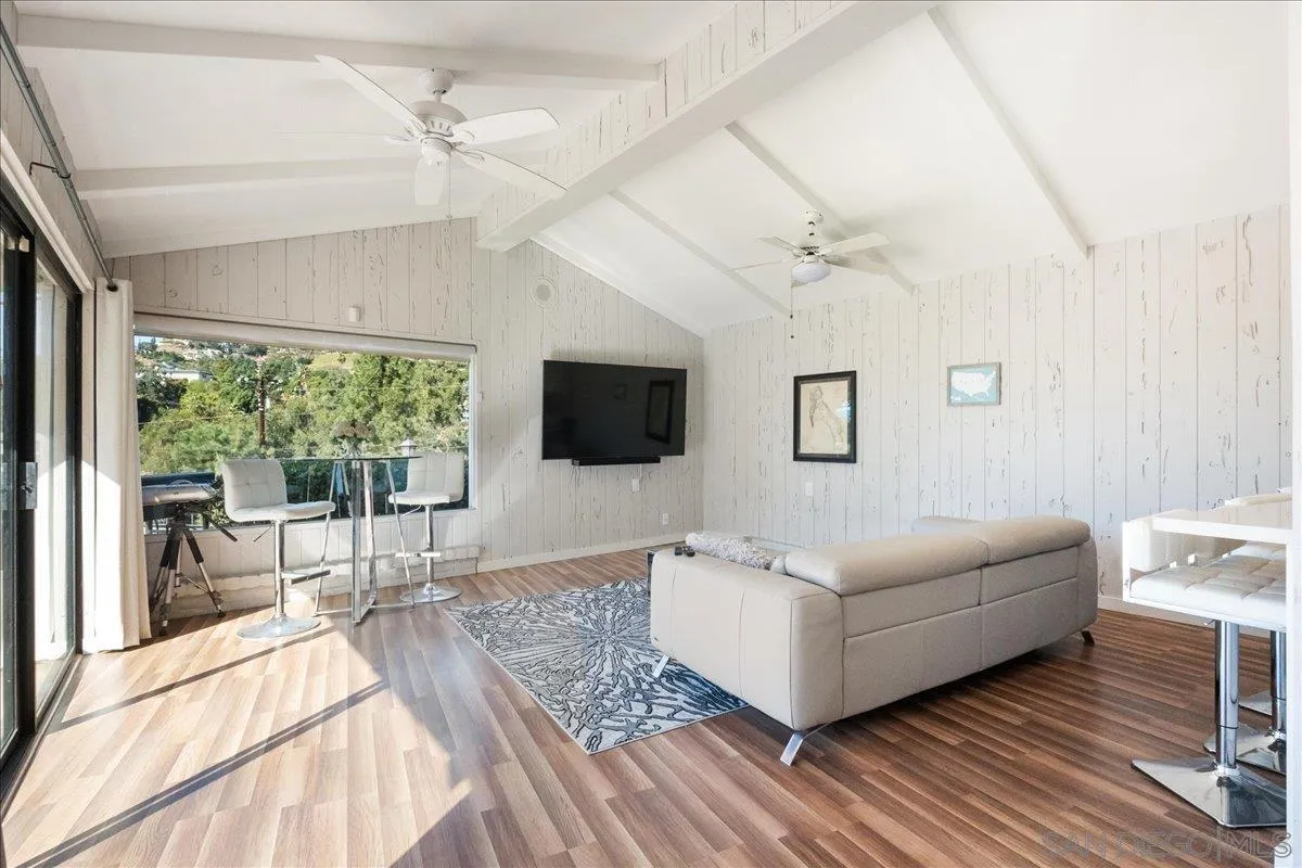 9817 Edgar Place La Mesa, CA 91941 - Photo 38 of 47 a living room with furniture and a flat screen tv