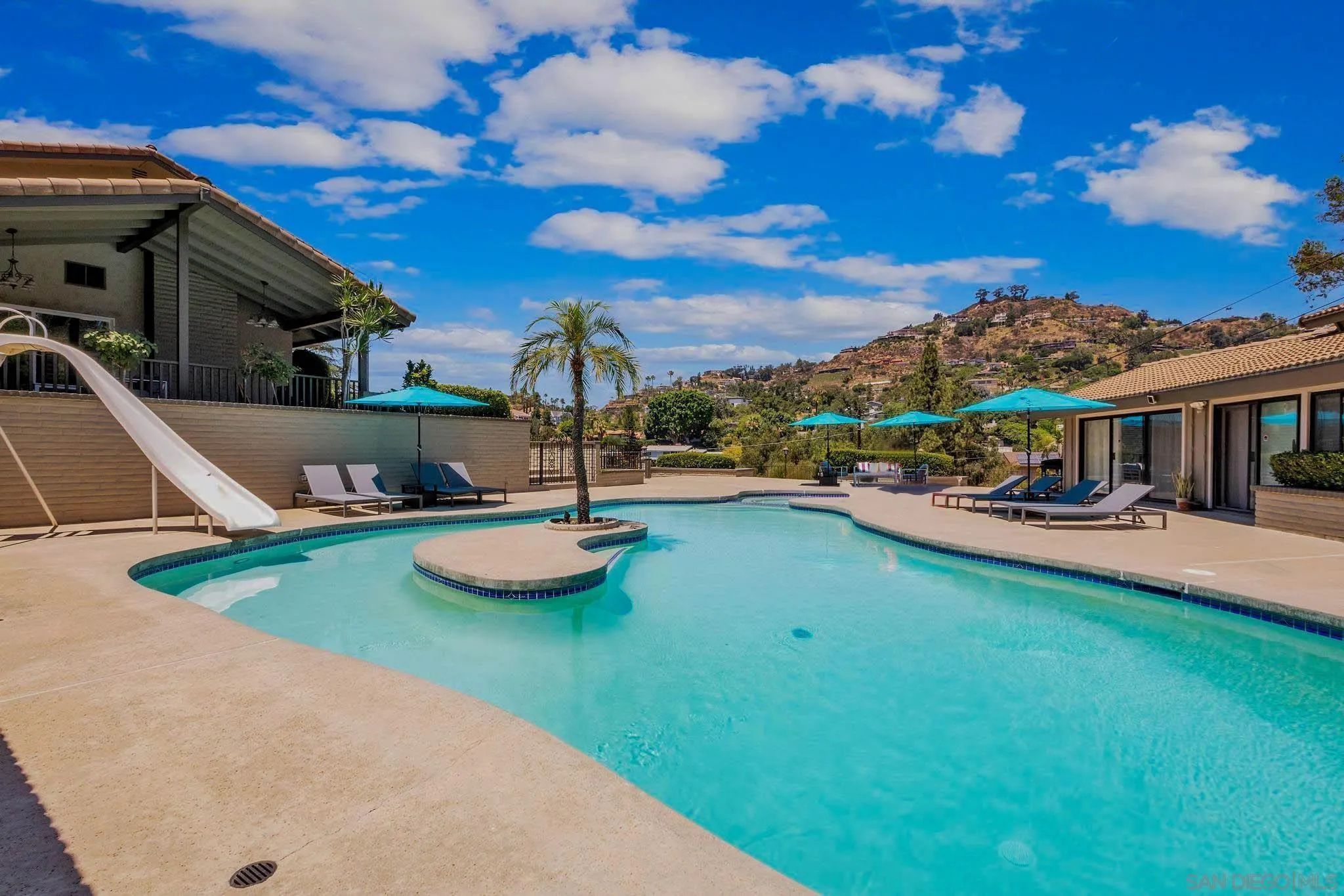 9817 Edgar Place La Mesa, CA 91941 - Photo 4 of 47 a view of a house with swimming pool yard and patio