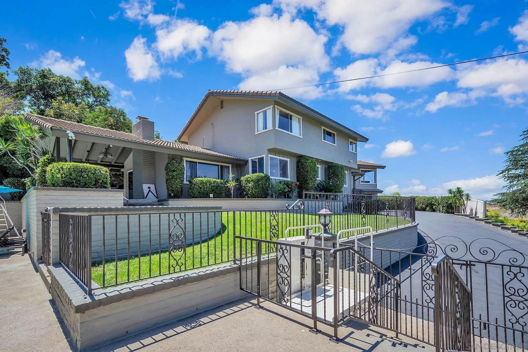 9817 Edgar Place La Mesa, CA 91941 - Photo 44 of 47 a view of a house with wooden deck and furniture