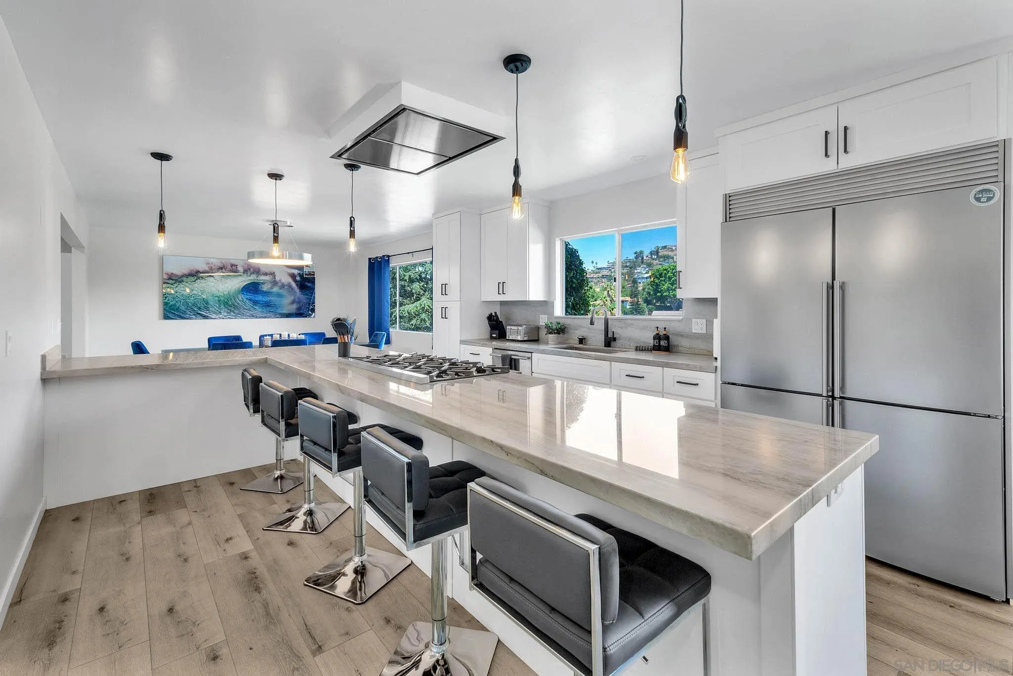 9817 Edgar Place La Mesa, CA 91941 - Photo 5 of 47 a kitchen with stainless steel appliances granite countertop a sink a stove and a refrigerator