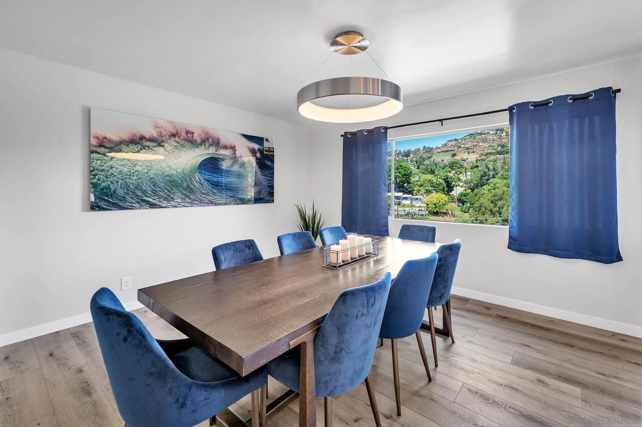 9817 Edgar Place La Mesa, CA 91941 - Photo 9 of 47 a view of a dining room with furniture and wooden floor