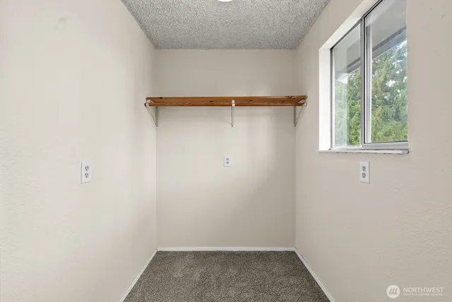 an empty room with a window