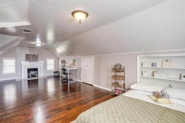 a bathroom with a sink a toilet a shower and a mirror